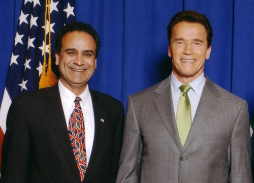 Harry Sidhu poses with a near life-size dummy of Arnold