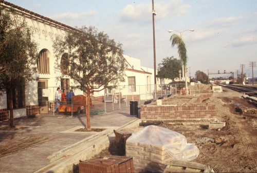0057350_0057350-R1-E005 Trees and planters block the platform; staff obstruction was almost as bad.