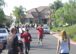 Teachers march on the home of CUSD Trustee Mike Winsten